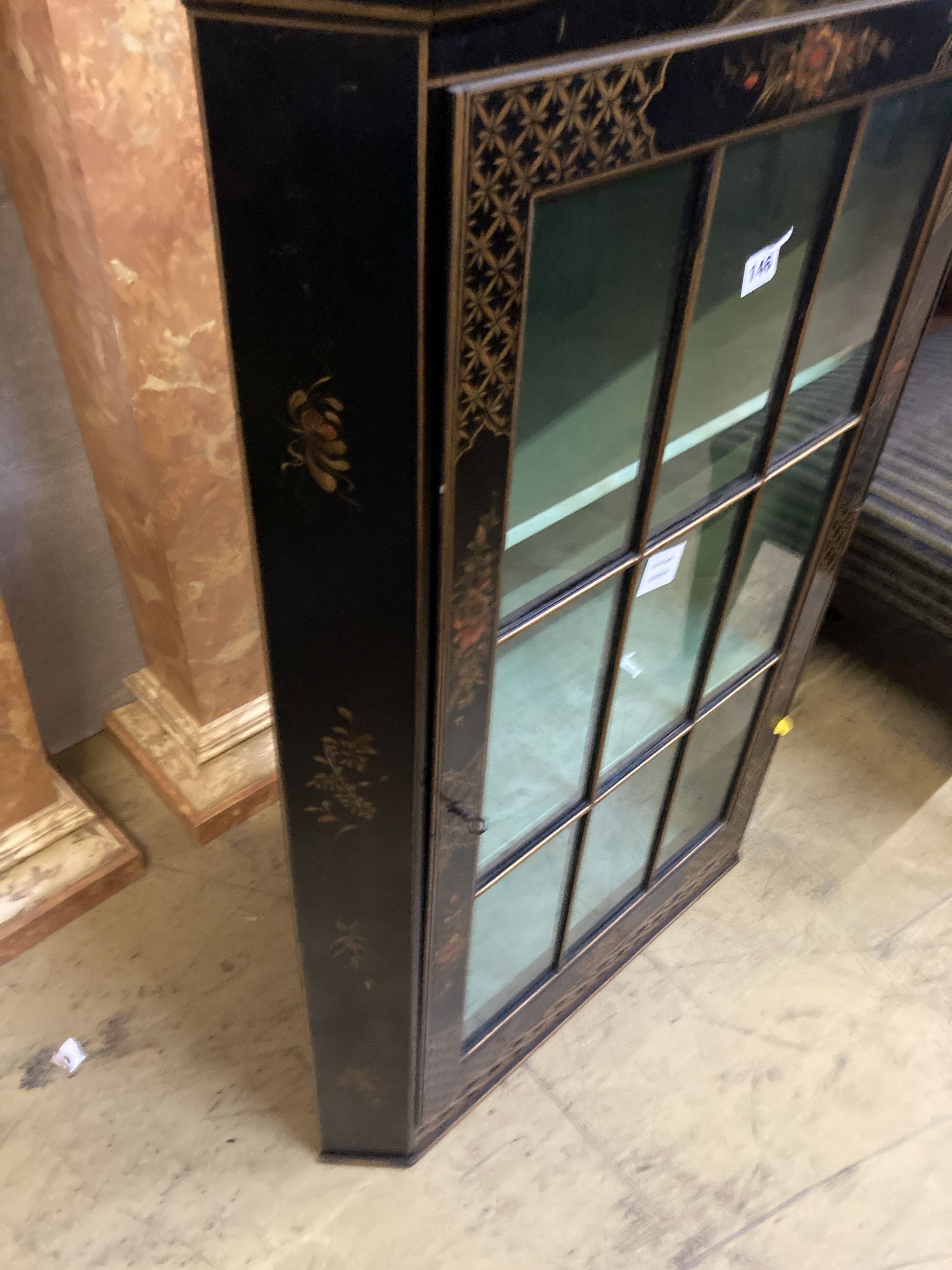 A 1920s chinoiserie lacquer hanging corner cabinet, width 66cm, depth 36cm, height 115cm